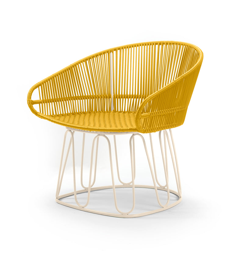 The Ames Circo Leather Lounge Chair by Ames features a bright yellow woven seat and backrest on a white metal frame, drawing inspiration from Colombian craftsmanship with an open geometric base for a modern, airy look.