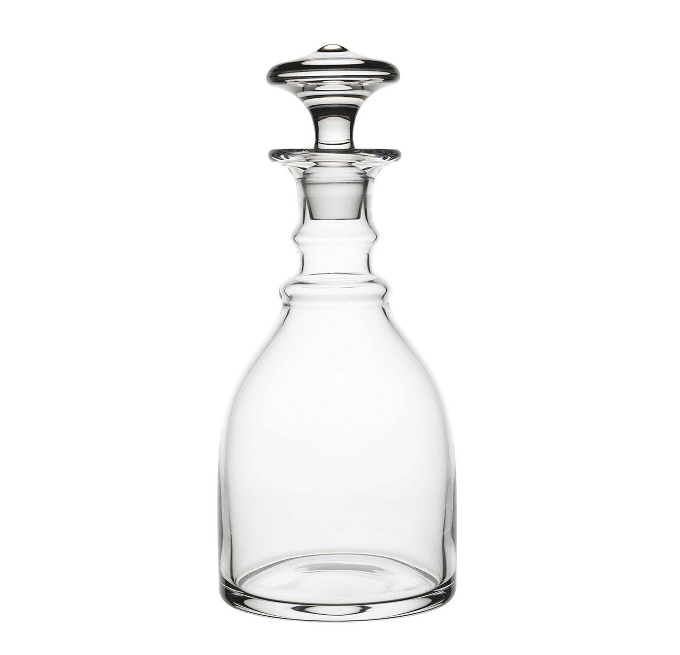 The Drinking Set No. 1 by Lobmeyr features a decanter made from mouth-blown lead-free crystal with clear, elegant curves and decorative ridges. A round stopper enhances its classic charm, echoing Josef Lobmeyrs timeless designs.