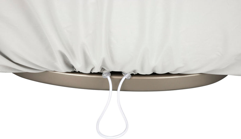 Beige circular base with a light gray fitted cover secured by two white drawstrings at the bottom edge