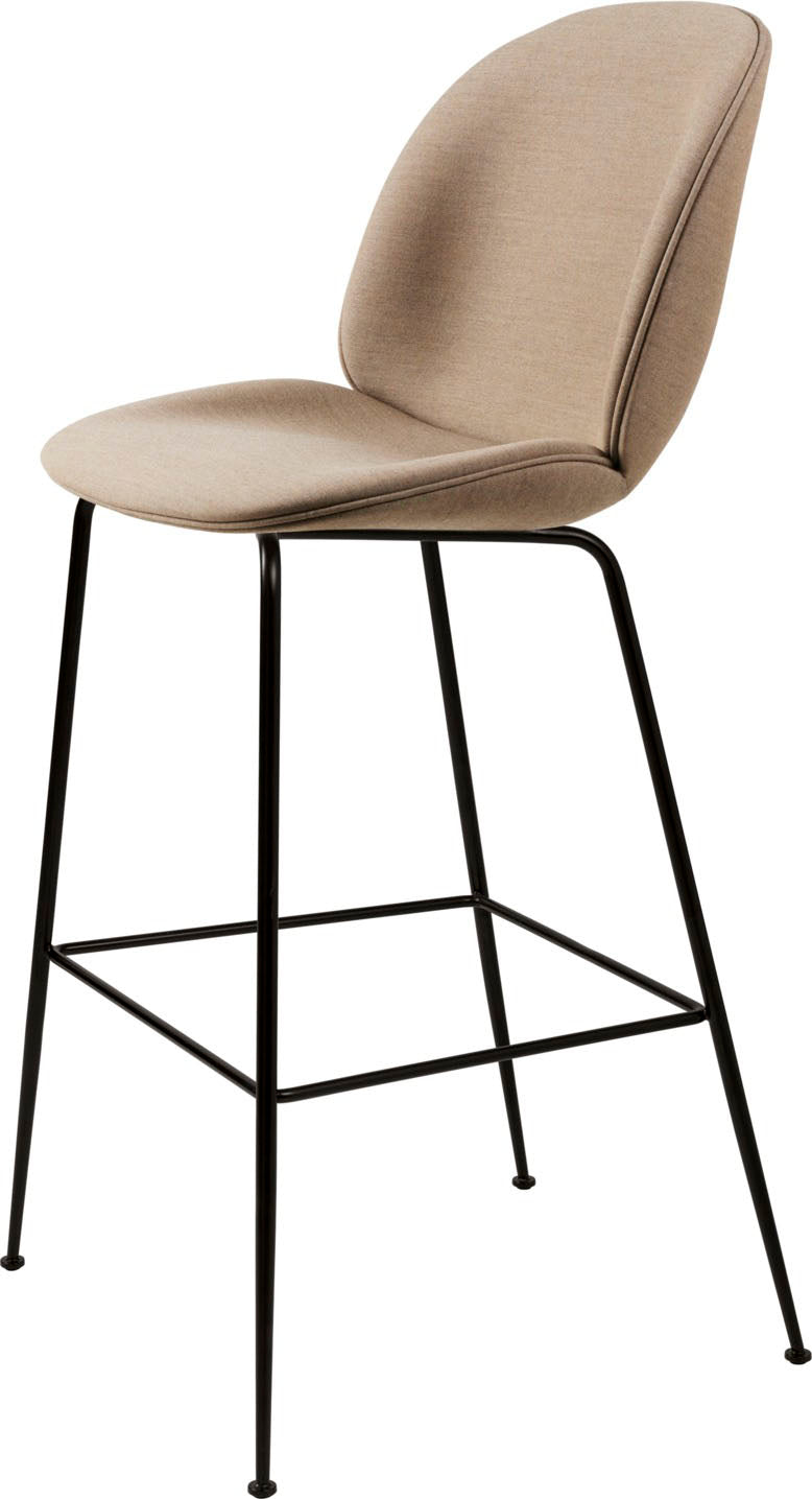 Beige fabric cushioned bar stool with curved backrest and slender black metal legs with footrest bar