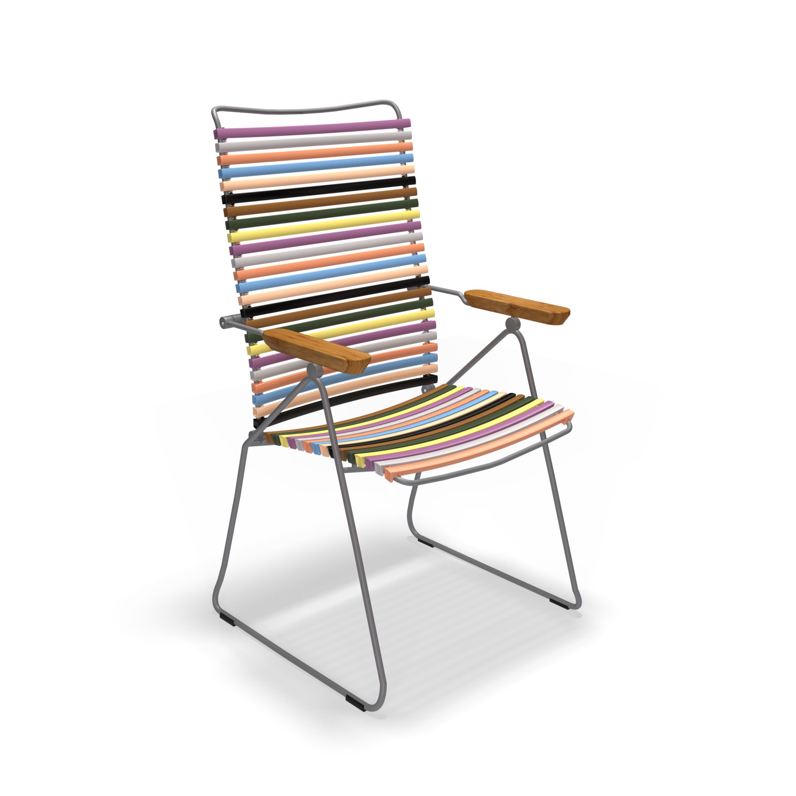 The Click Position Chair by Houe is weather-resistant outdoor seating with multicolored plastic lamellas, wooden armrests, and a metal frame, styled against a solid black background.
