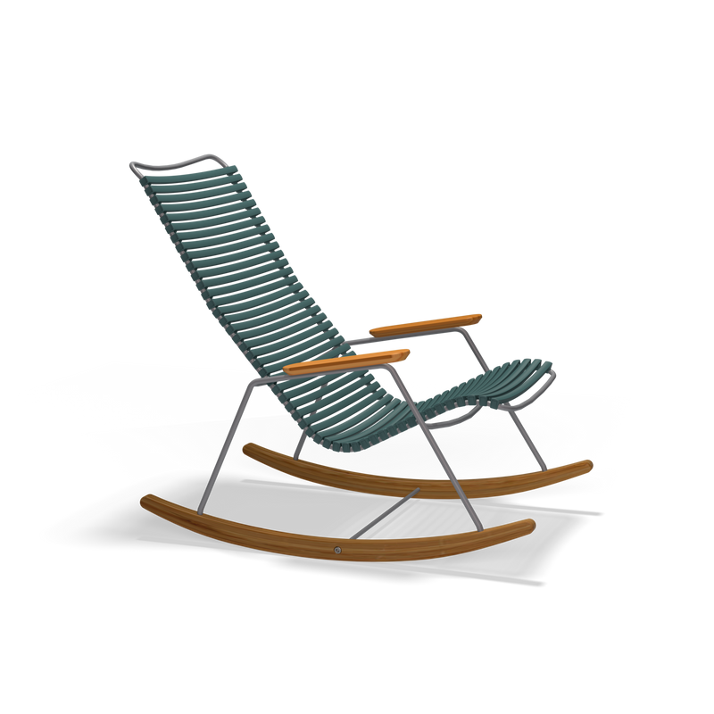 The Click Rocking Chair by Houe boasts a sleek metal frame made from powder-coated steel, a green ribbed cushion, and stylish wooden armrests and rockers against a black background.
