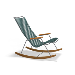 The Click Rocking Chair by Houe boasts a sleek metal frame made from powder-coated steel, a green ribbed cushion, and stylish wooden armrests and rockers against a black background.