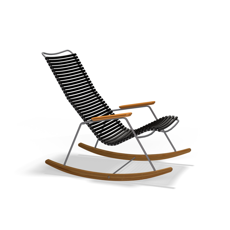 The Houe Click Rocking Chair showcases a modern black and silver design with striped patterns, sleek wooden armrests, and curved rockers. Made for style and comfort, its powder-coated steel elements ensure durability and make it perfect for outdoor lounging against a black backdrop.