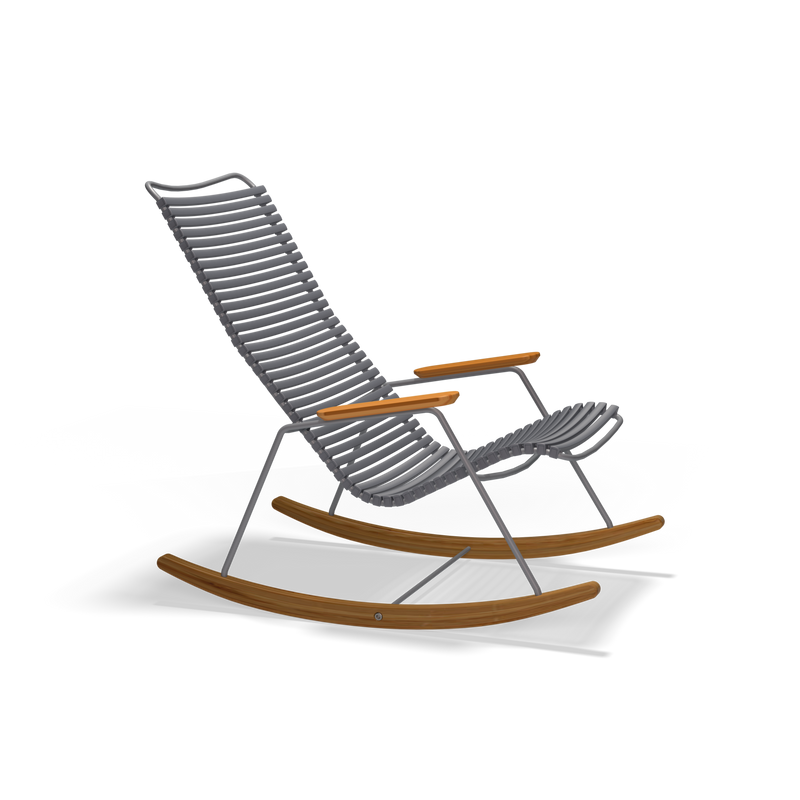 The Houe Click Rocking Chair is a modern outdoor chair featuring a grey woven seat and backrest, wooden armrests, and curved wooden rocker legs on a sleek black frame, combining style with weather resistance.