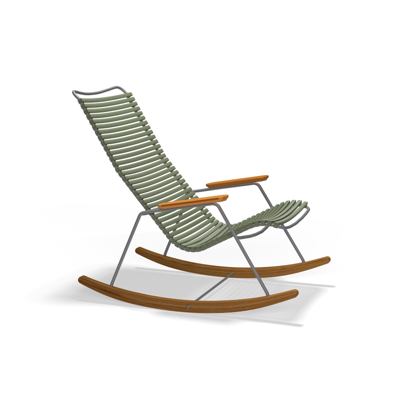 The Click Rocking Chair by Houe features a sleek design with weather-resistant green ribbed seating and backrest. It combines wooden armrests and curved rockers with a metal frame for a contemporary look, perfect for outdoor spaces. The background is solid black.