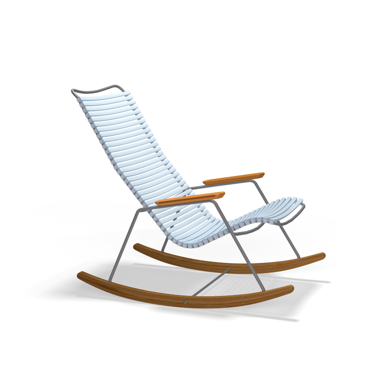 The Click Rocking Chair by Houe offers a sleek, modern design with white plastic lamellas for the seat and backrest, wooden armrests, and curved wooden rockers against a black background. Perfect for outdoor use.