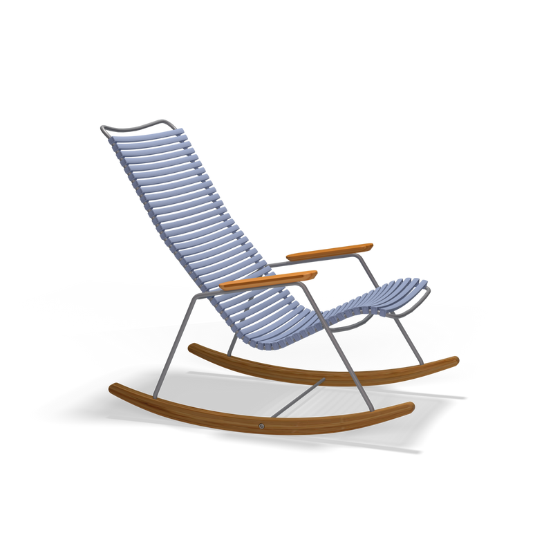 The Houe Click Rocking Chair combines stylish weather-resistant blue cushioned slats with wooden armrests and rocker legs. Its sturdy metal frame ensures durability, making it perfect for outdoor settings, all set against a classic black backdrop.