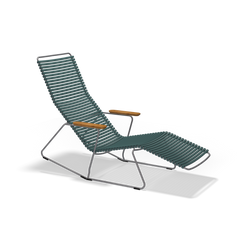 The Click Sunrocker by Houe is a contemporary outdoor chair featuring a sleek metal frame, teal rope seat and backrest, wooden armrests, and an extended leg rest, all set against a solid black background.