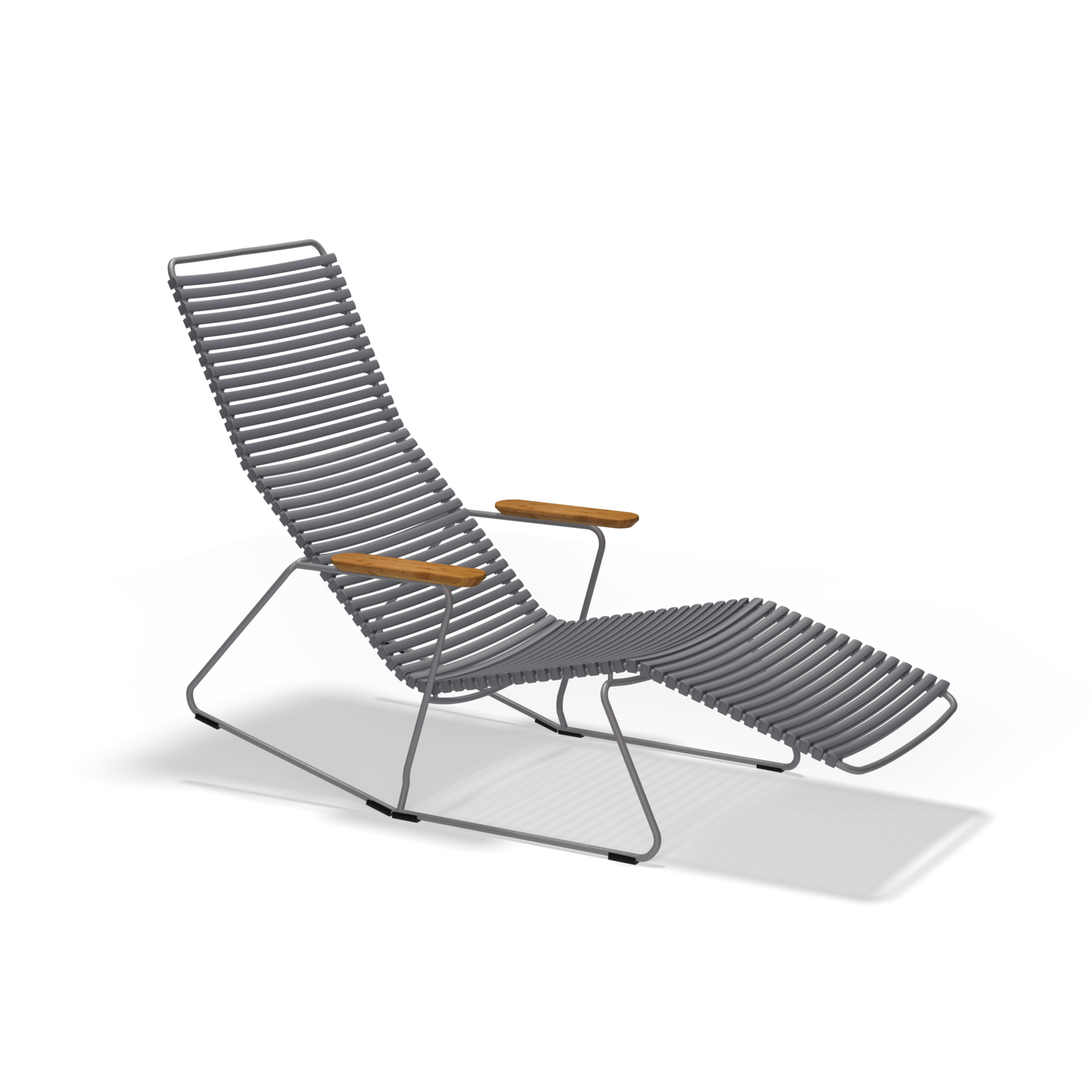 The Click Sunrocker by Houe is a contemporary outdoor reclining lounge chair with a minimalist design. It has a gray slatted plastic lamella seat and backrest, complemented by wooden armrests and a sleek metal frame, providing an angular modern style.