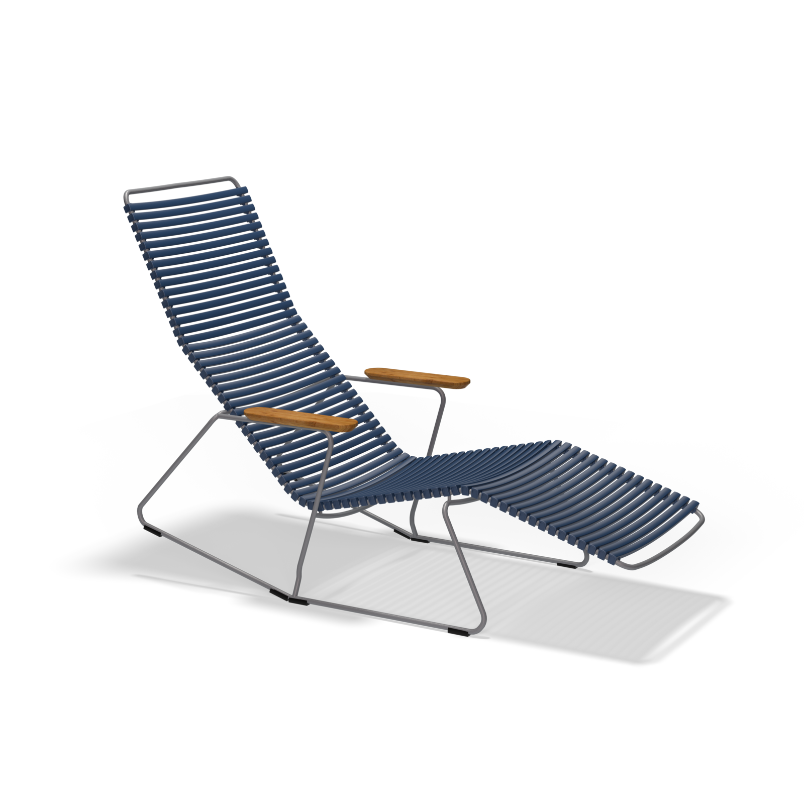 The Click Sunrocker by Houe is a modern outdoor lounge chair featuring a powder-coated steel frame, dark blue woven seat, wooden armrests, and an ergonomic reclining design, ideal for improving any outdoor chair collection.