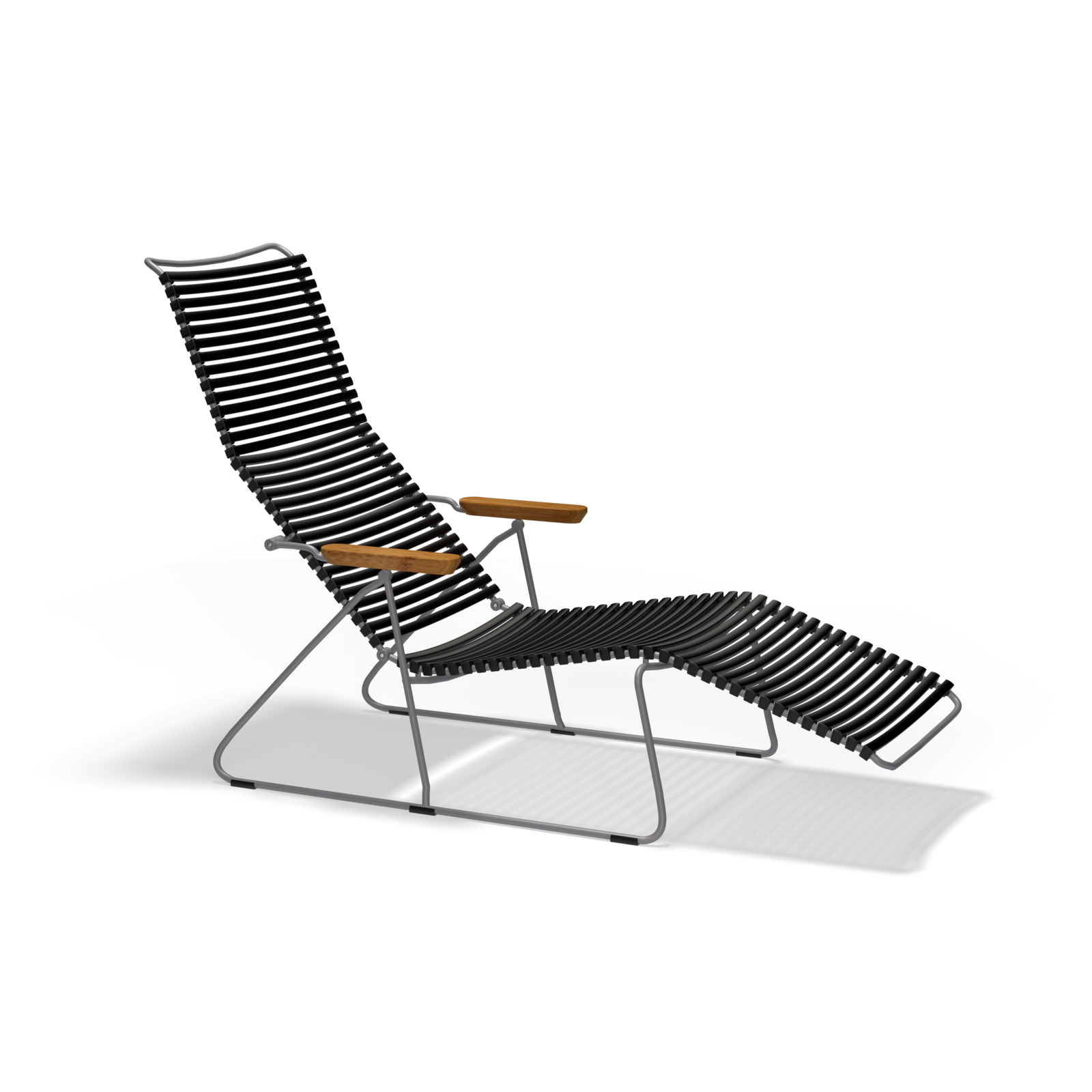 The Click Sunlounger by Houe is a sleek black outdoor lounge chair featuring a metal frame and wooden armrests, designed for comfort without cushions. Its modern minimalist design includes recline capabilities, UV protection, and stylish appeal against a plain black backdrop.