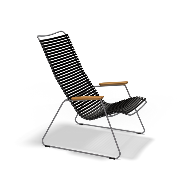 The Houe Click Lounge Chair features sleek, angular black metal slat design with bamboo armrests, ideal for outdoor settings. Its minimalist style on a plain black background makes it a standout piece among modern lounge chairs.