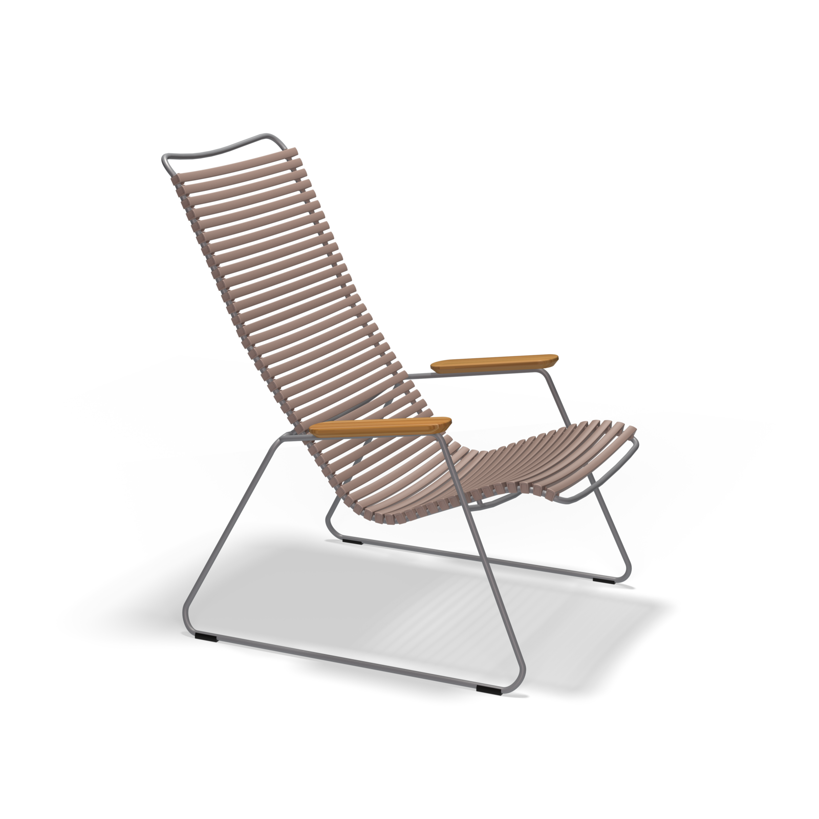 The Click Lounge Chair by Houe is a modern, minimalist lounge chair with a high backrest and bamboo details. It features parallel horizontal wooden slats and armrests, with a thin black metal frame for a sleek, airy design ideal for outdoor use.