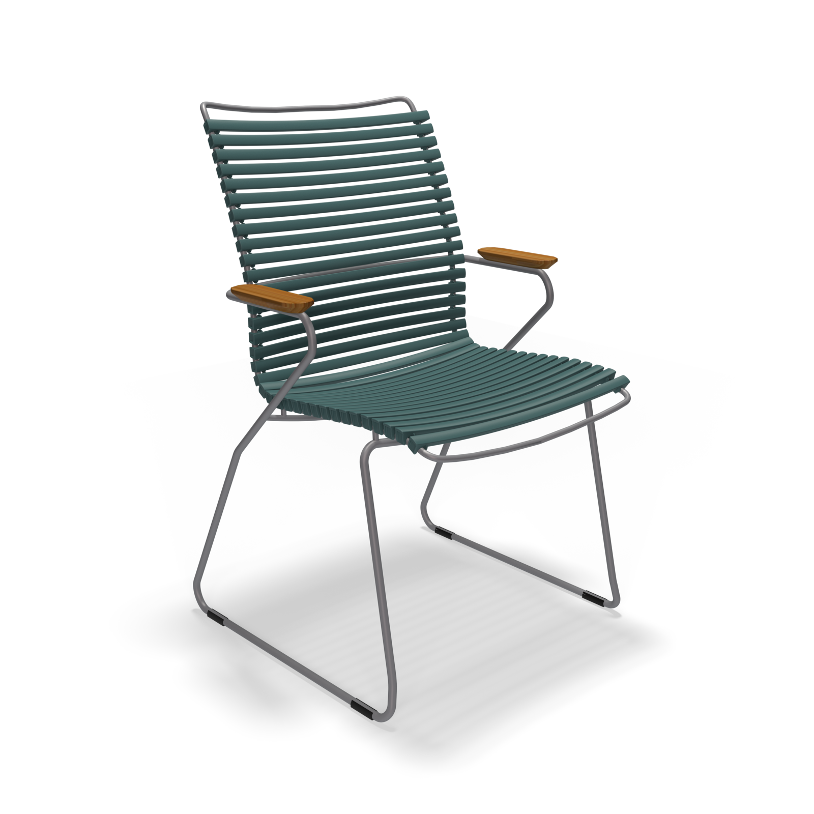 The Click Dining Chair with Armrest - Tall Back by Houe is a modern outdoor chair featuring a blue slatted design, wooden armrests, and a weather-resistant metal frame with a cantilever base. Its UV-protected materials offer lasting durability and minimalist style for outdoor comfort.