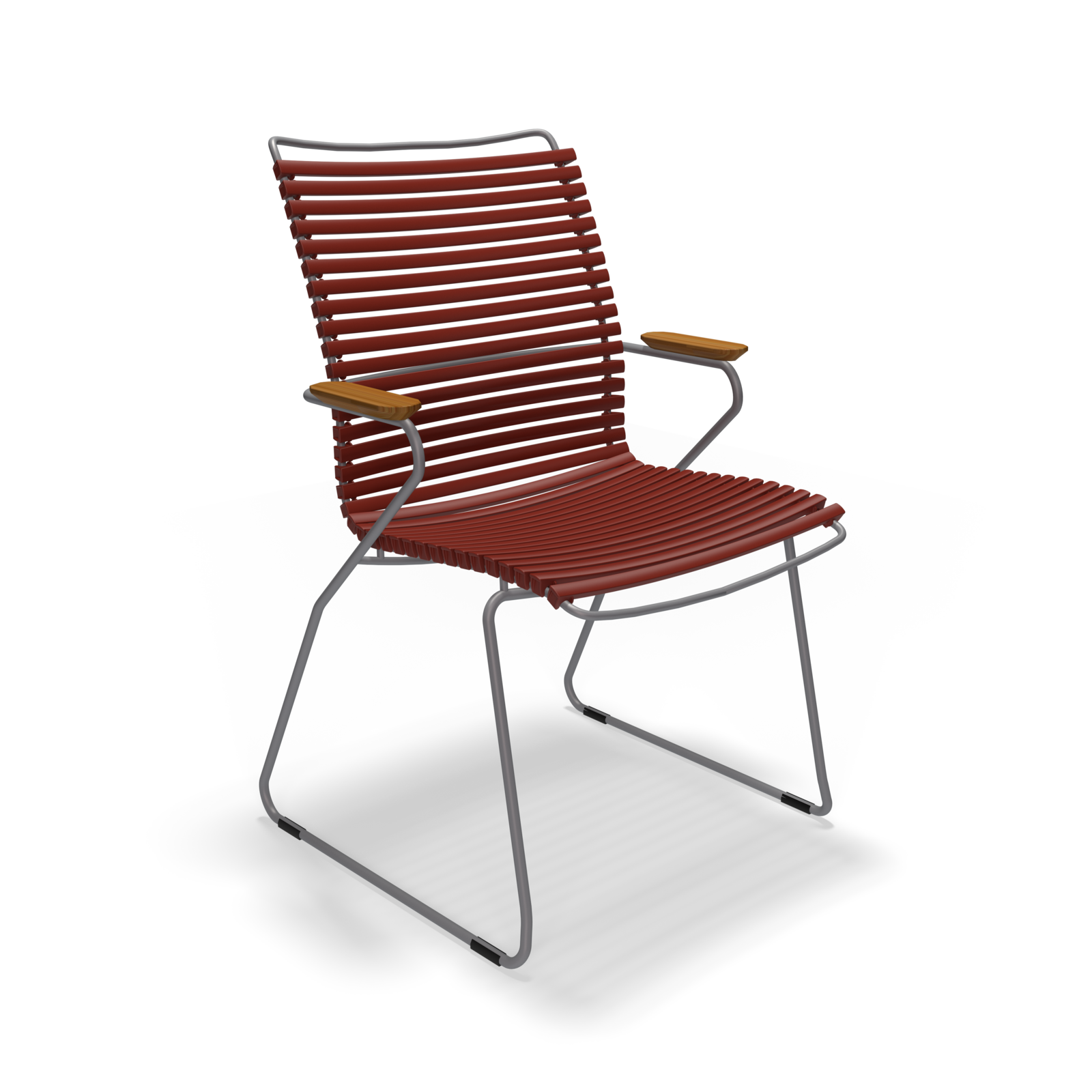 The Houe Click Dining Chair with Armrest features a tall back, weather-resistant metal frame, and horizontal slats. It boasts curved armrests with wooden accents, sleek looped legs connecting to the backrest, and a minimalist modern design with UV protection for lasting vibrancy.
