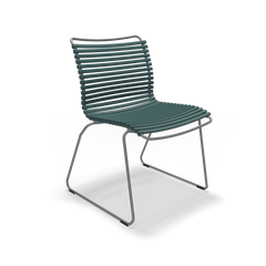 The Click Dining Chair without Armrest by Houe is a modern piece with a sleek, minimalist design. It has weather-resistant dark green plastic lamellas for the seat and backrest, supported by a thin metal base with angled legs. This airy contemporary style is perfect for outdoor settings.