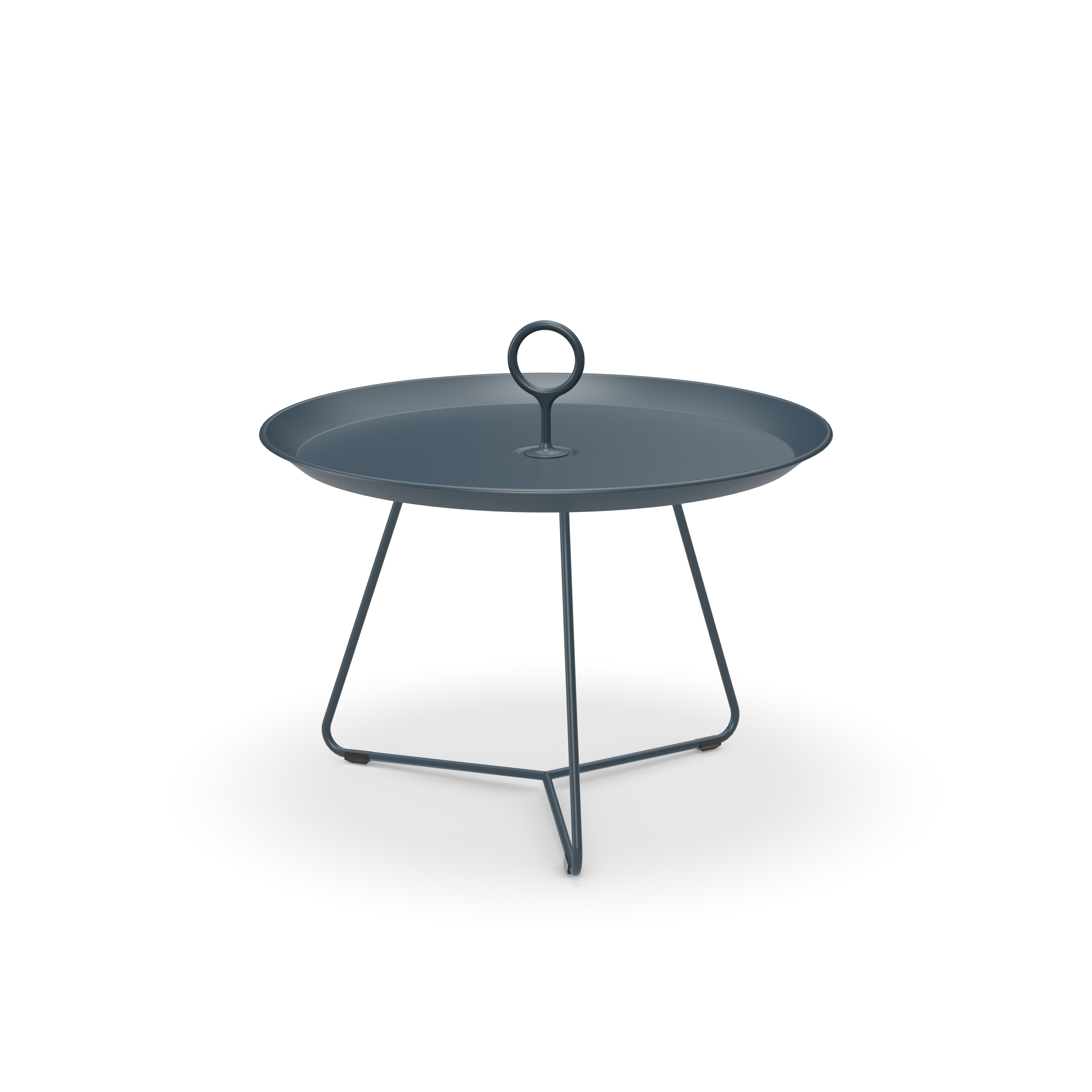 The Eyelet Tray Table by Houe is a modern, minimalist round side table featuring a dark gray metal tray top with a central circular handle. Its crafted from powder-coated steel and supported by three slender legs.