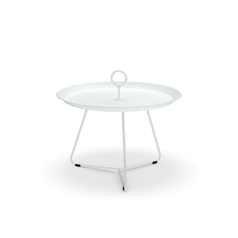 The Houe Eyelet Tray Table is an elegant white side table made from powder-coated steel, boasting a round tray top with a central handle and three slender angled legs against a black background.