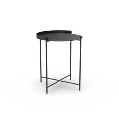 The Edge Tray Table by Houe is a sleek, modern black round tray table with raised edges made from powder-coated steel. It features slender, minimalist metal legs with crossbars for a lightweight and stylish look.