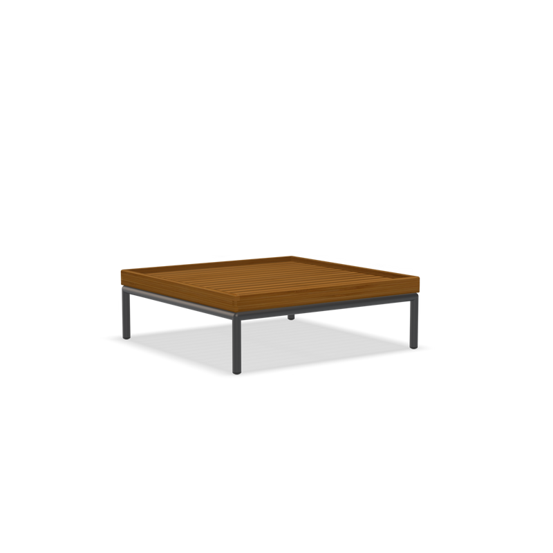 The Level Coffeetable by Houe features a square wooden slatted top and black powder-coated aluminum legs, showcasing a modern, minimalist design.