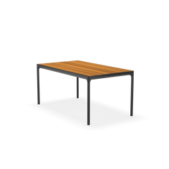 The Four Dining Table by Houe features a powder coated aluminum frame and wooden slatted top, shown on a plain white background—ideal as an outdoor dining table.