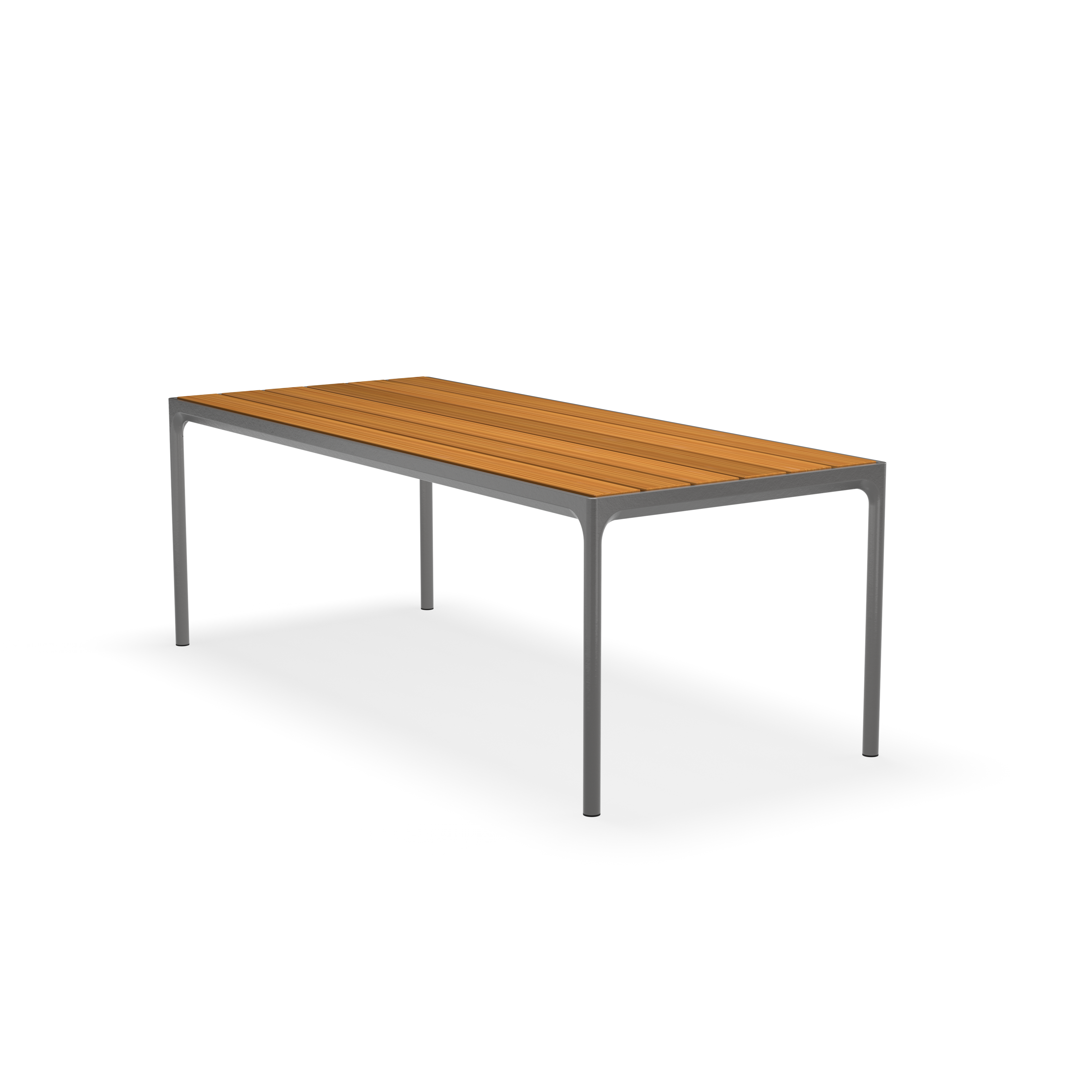 The Four Table by Houe is a minimalist, modern rectangular table with a bamboo top and sleek, powder-coated aluminum legs, showcased against a plain black background.