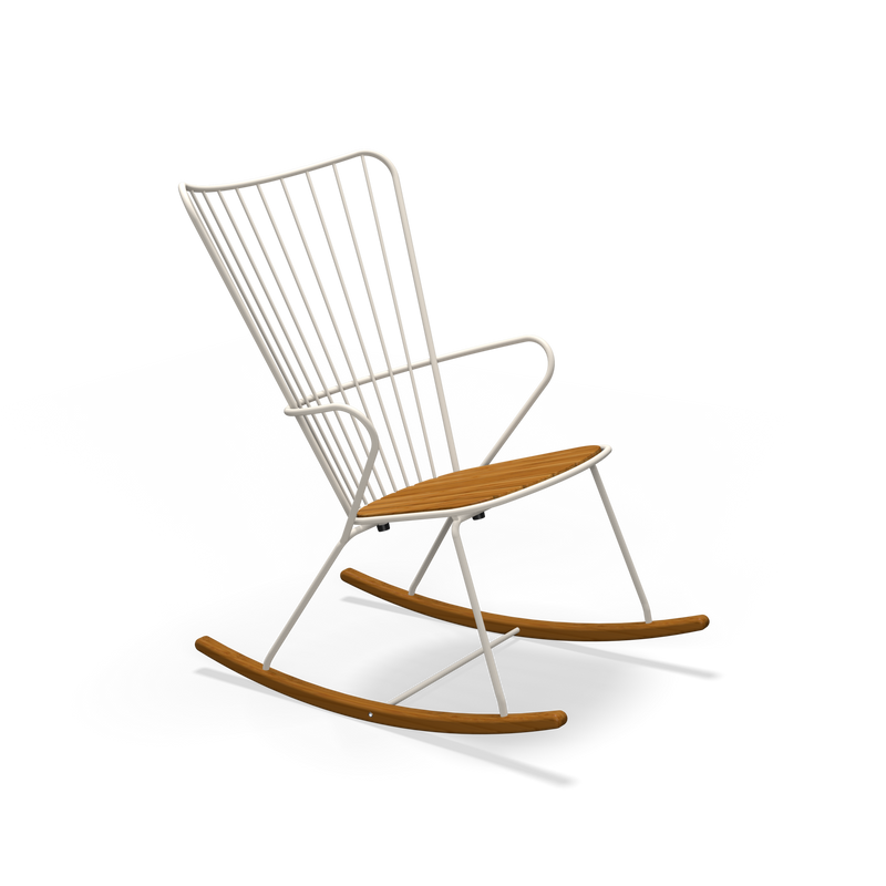 The Houe Paon Rocking Chair features a sleek white powder-coated steel frame with wooden seat and rockers. Its minimalist design includes vertical slats forming the backrest, creating a contemporary yet classic look against a black backdrop.