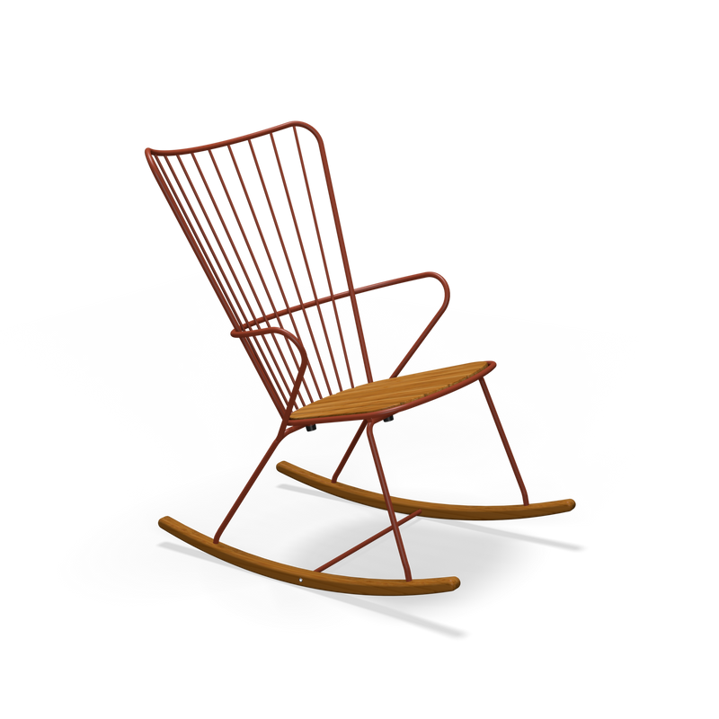 Introducing the Paon Rocking Chair by Houe: a modern minimalist chair with a powder-coated steel frame in vibrant red and a sleek wooden seat. Its high backrest and elegant lines offer unparalleled comfort and style against a solid black background.