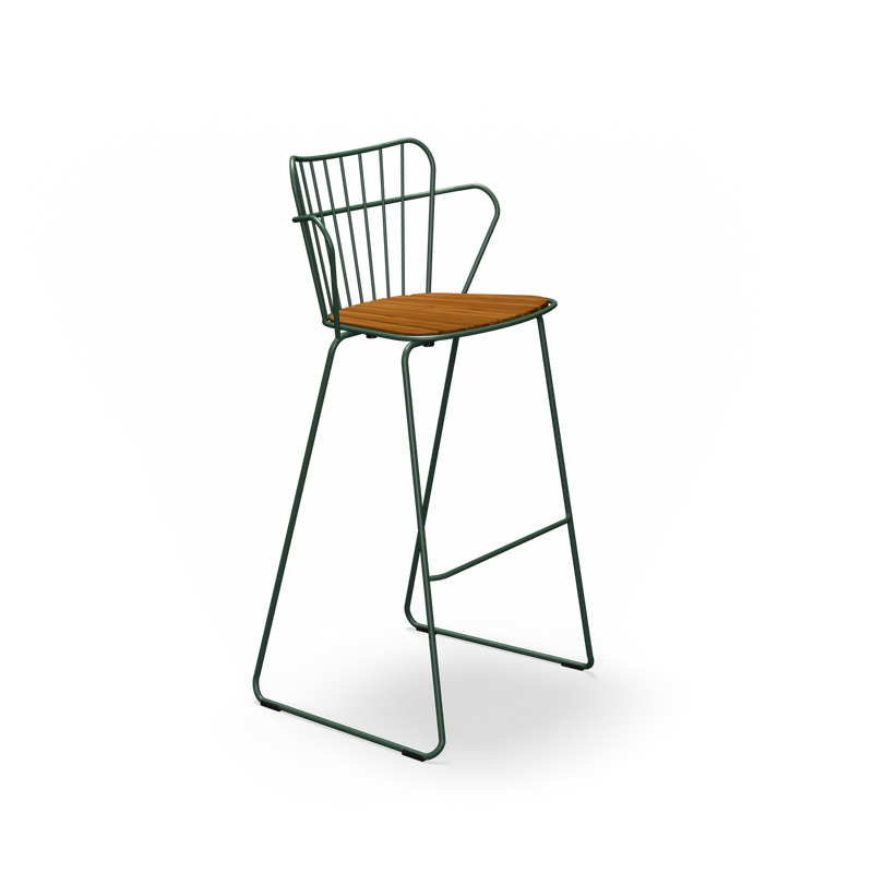 The Paon Barstool by Houe is a tall metal piece with a high backrest and wooden seat, showcasing Scandinavian style. Its dark green frame has minimalist lines and a footrest, resembling PAON chairs, all set elegantly against a plain black background.