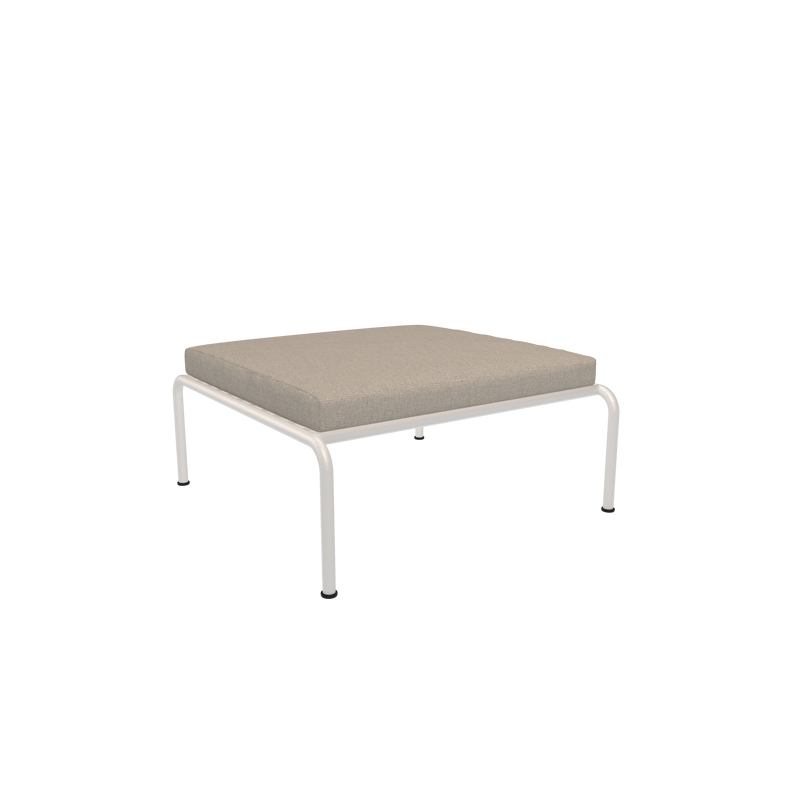 Part of the Houe collection, the Avon Ottoman features a gray cushion with a white metal frame on a black background. It perfectly blends style and functionality and is weather-resistant for lasting use in any setting.