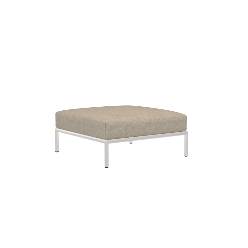 The Level Ottoman by Houe is a square beige piece with a minimalist design, featuring a thin white powder-coated aluminum frame and legs, set against a black background.