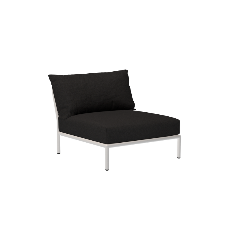 The Level Lounge Chair by Houe boasts a minimalist design with a black cushioned seat and backrest. Its sleek, white powder-coated aluminum frame and legs contrast elegantly with the plain black background, exuding sophistication and style.