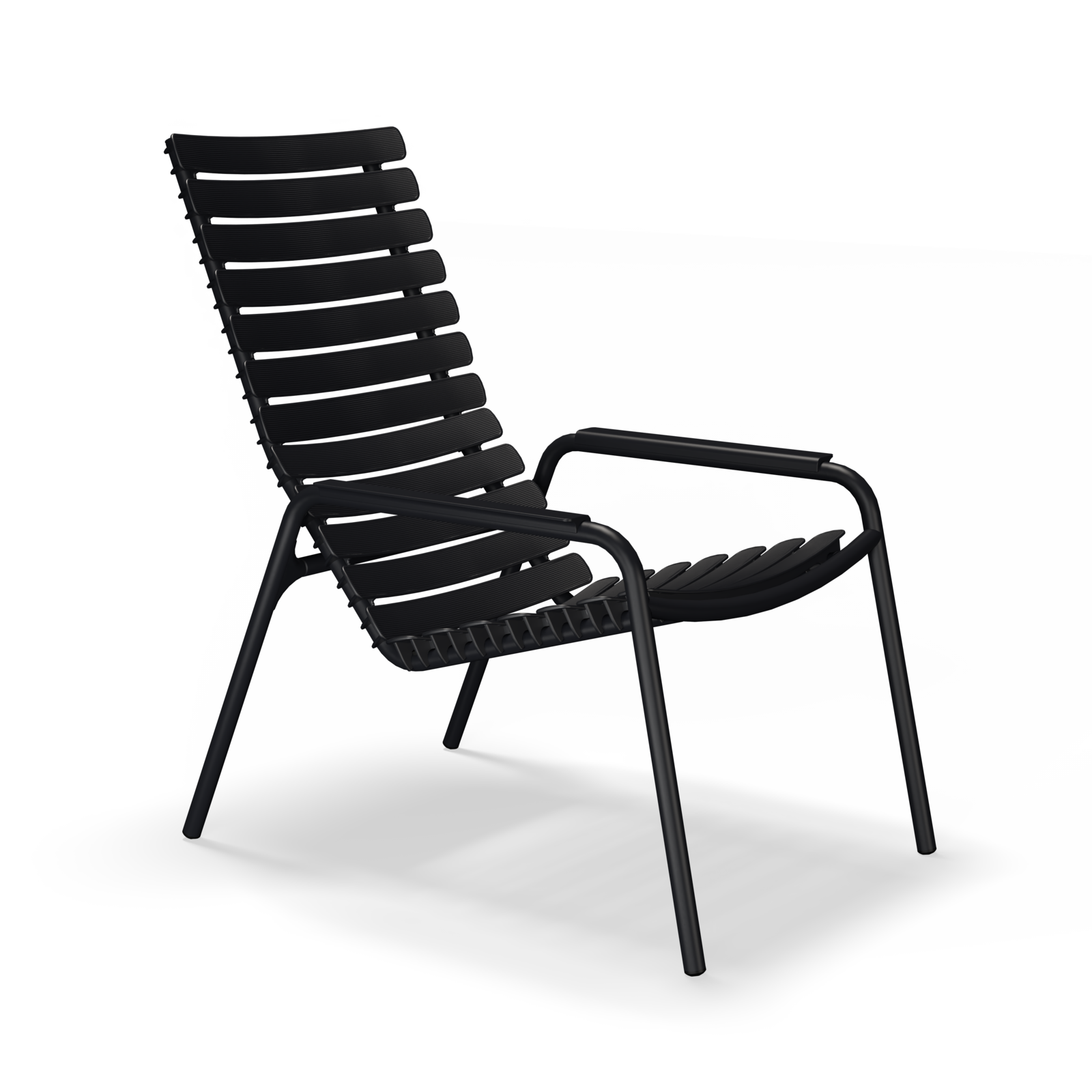 The ReClips Lounge Chair by Houe is a modern, black, slatted piece with a sleek metal frame and angled backrest. Highlighting elegant Danish design, its crafted from recycled plastic for sustainable sophistication and photographed against a plain black backdrop.