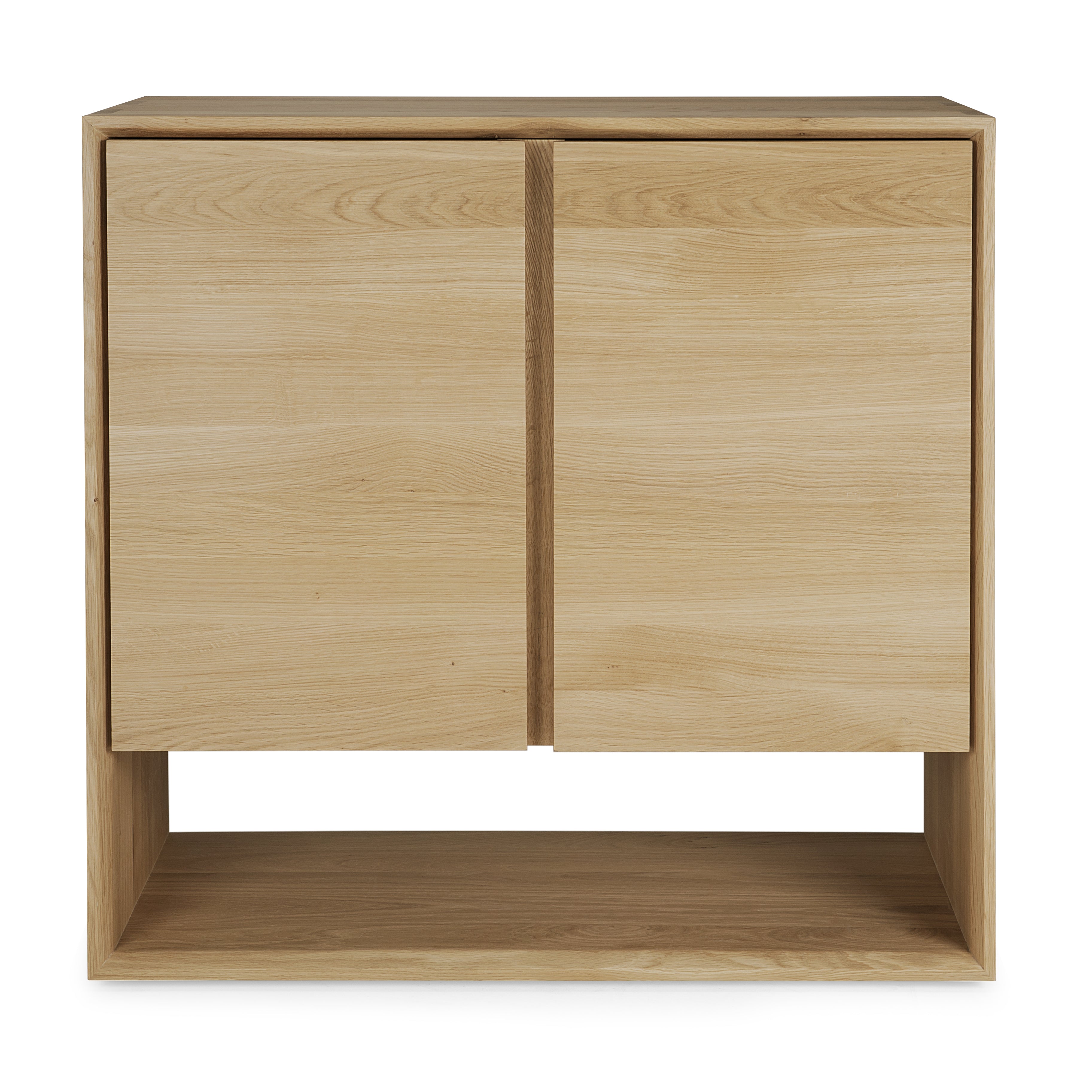 The Ethnicraft Nordic Sideboard is a modern, minimalist cabinet with two doors, a natural light wood finish, beveled edges, clean lines, and an open shelf at the bottom.