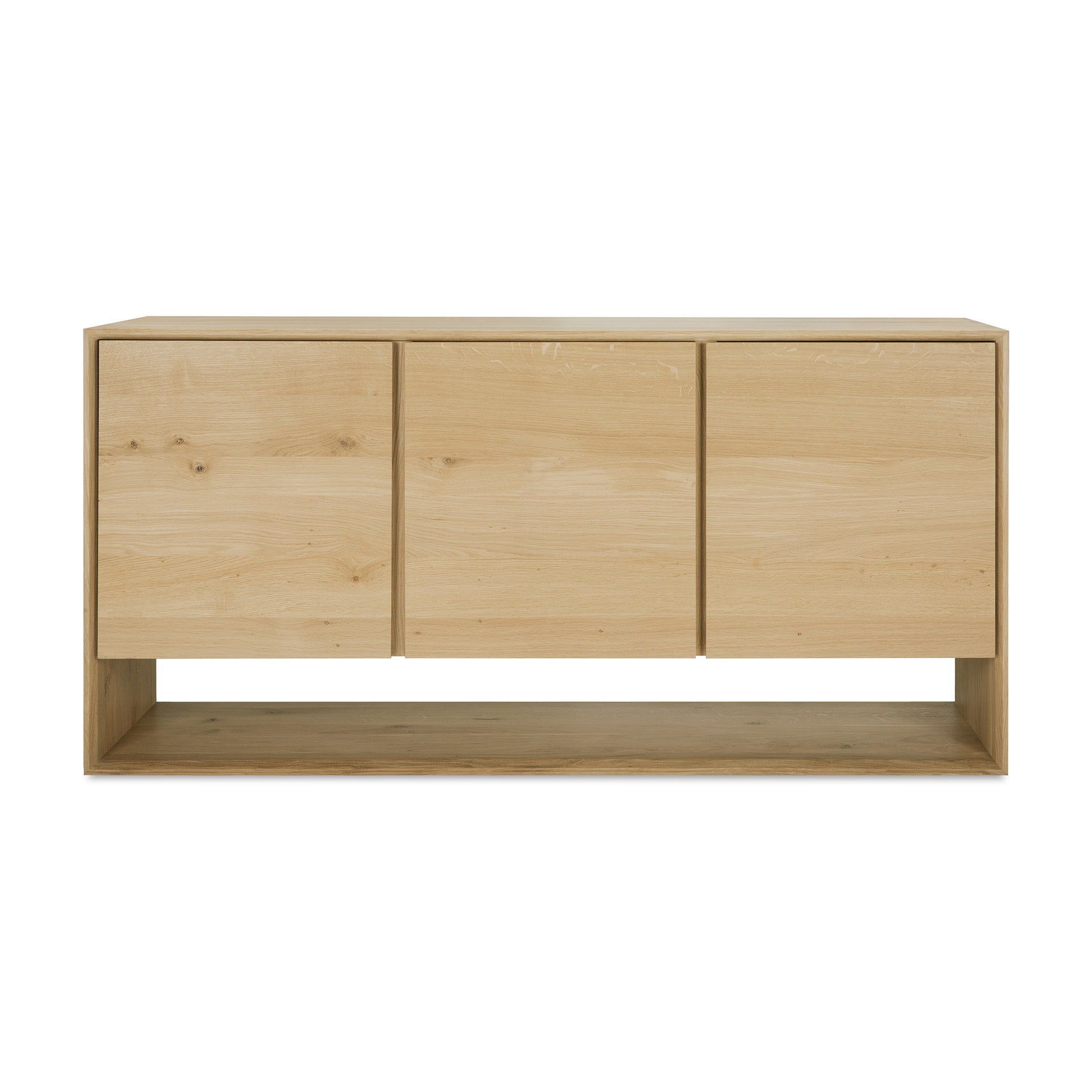 The Ethnicraft Nordic Sideboard features a modern light wood design with beveled edges, three flat doors, and a lower open shelf, shown against a white background.