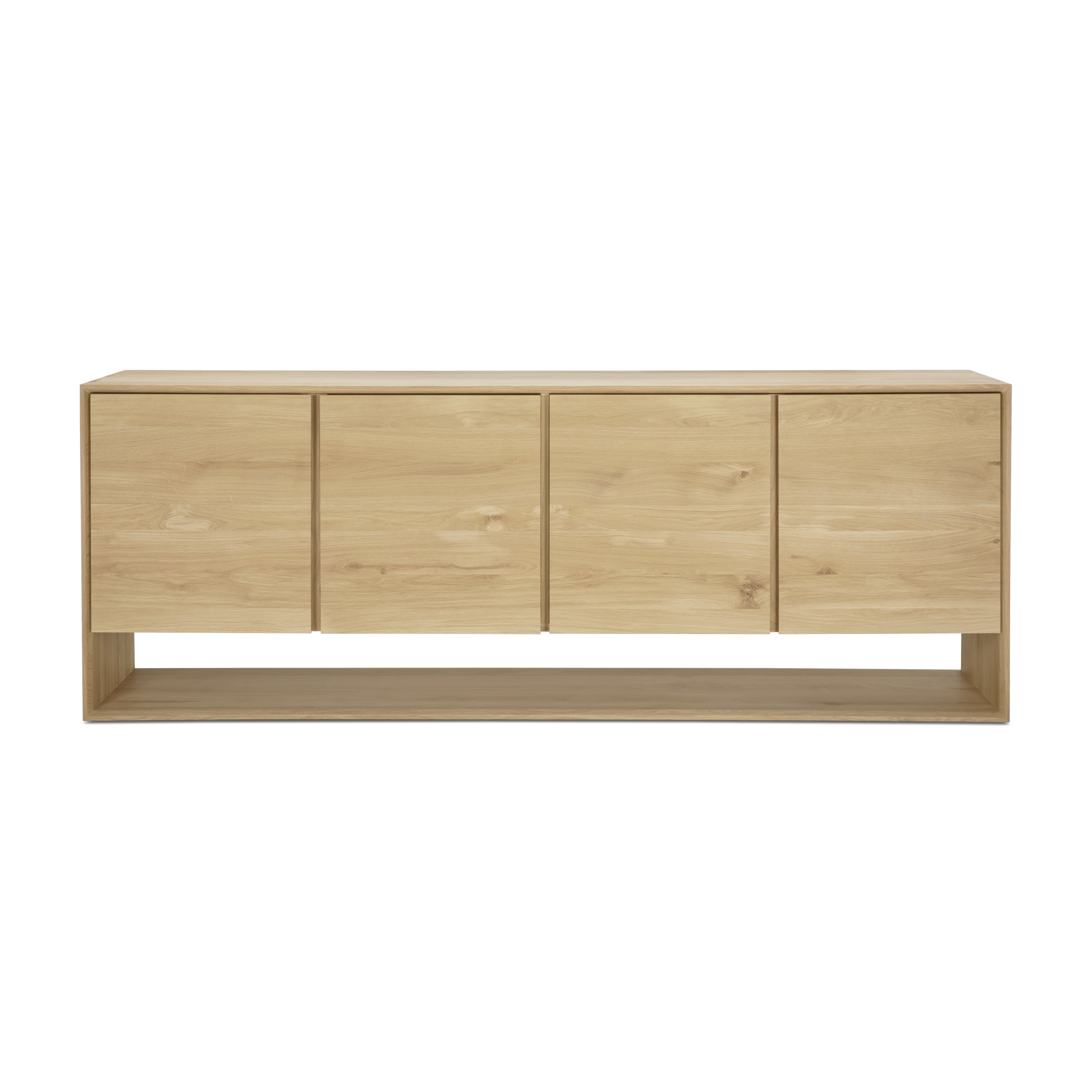 The Ethnicraft Nordic Sideboard features a modern rectangular design in light wood, beveled edges, four cabinet doors, and a bottom open shelf, shown against a plain white background.