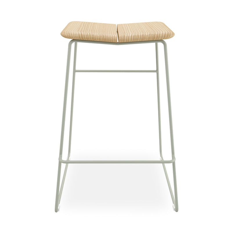 The Gus Modern Aero Bar Stool features a light solid Ash wood seat with a central groove and a minimal white metal frame, highlighting Scandinavian design on a plain white background.