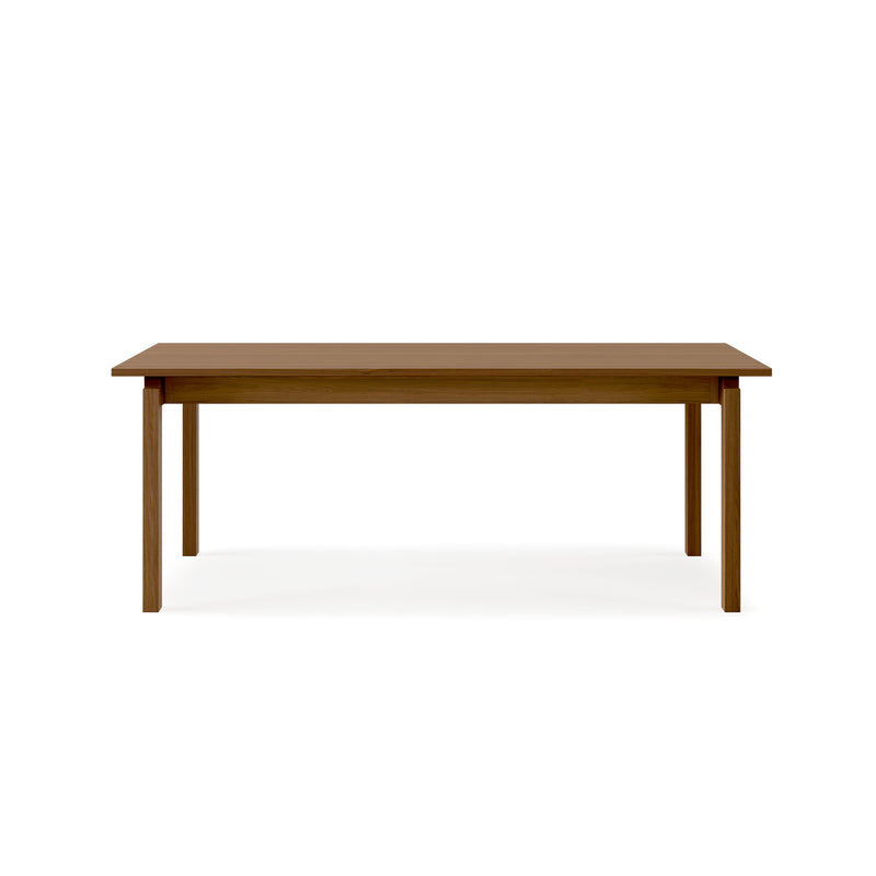 The Gus Modern Annex Extendable Dining Table features a simple rectangular design with four straight legs, photographed against a white background. Inspired by clean lines, it delivers timeless style and function to any space.