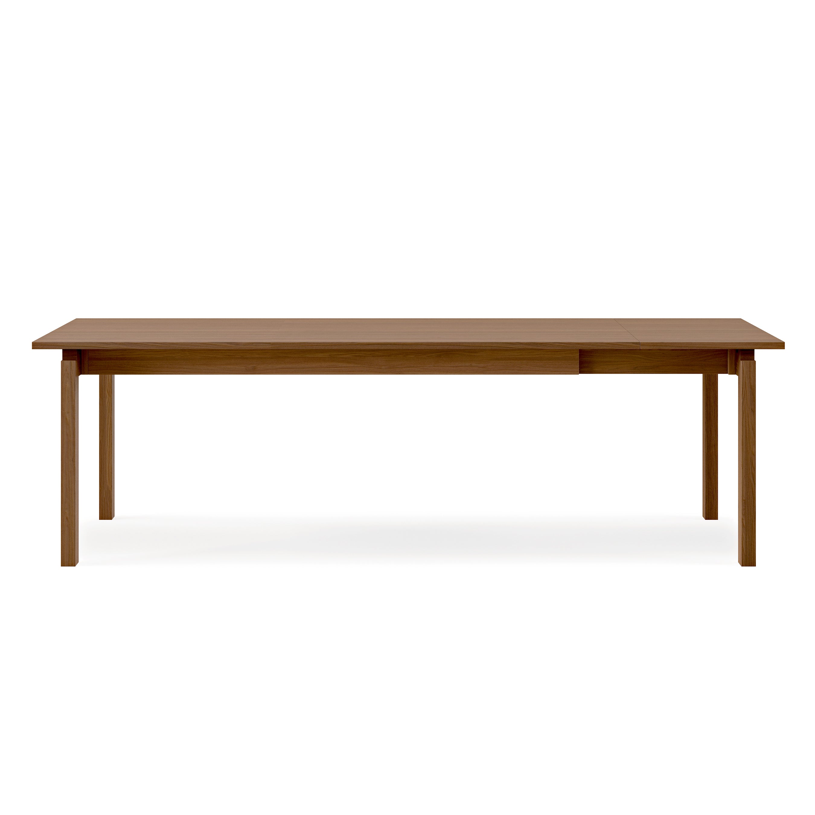The Gus Modern Annex Extendable Dining Table features a rectangular wooden top with four straight legs, displayed against a plain white background.