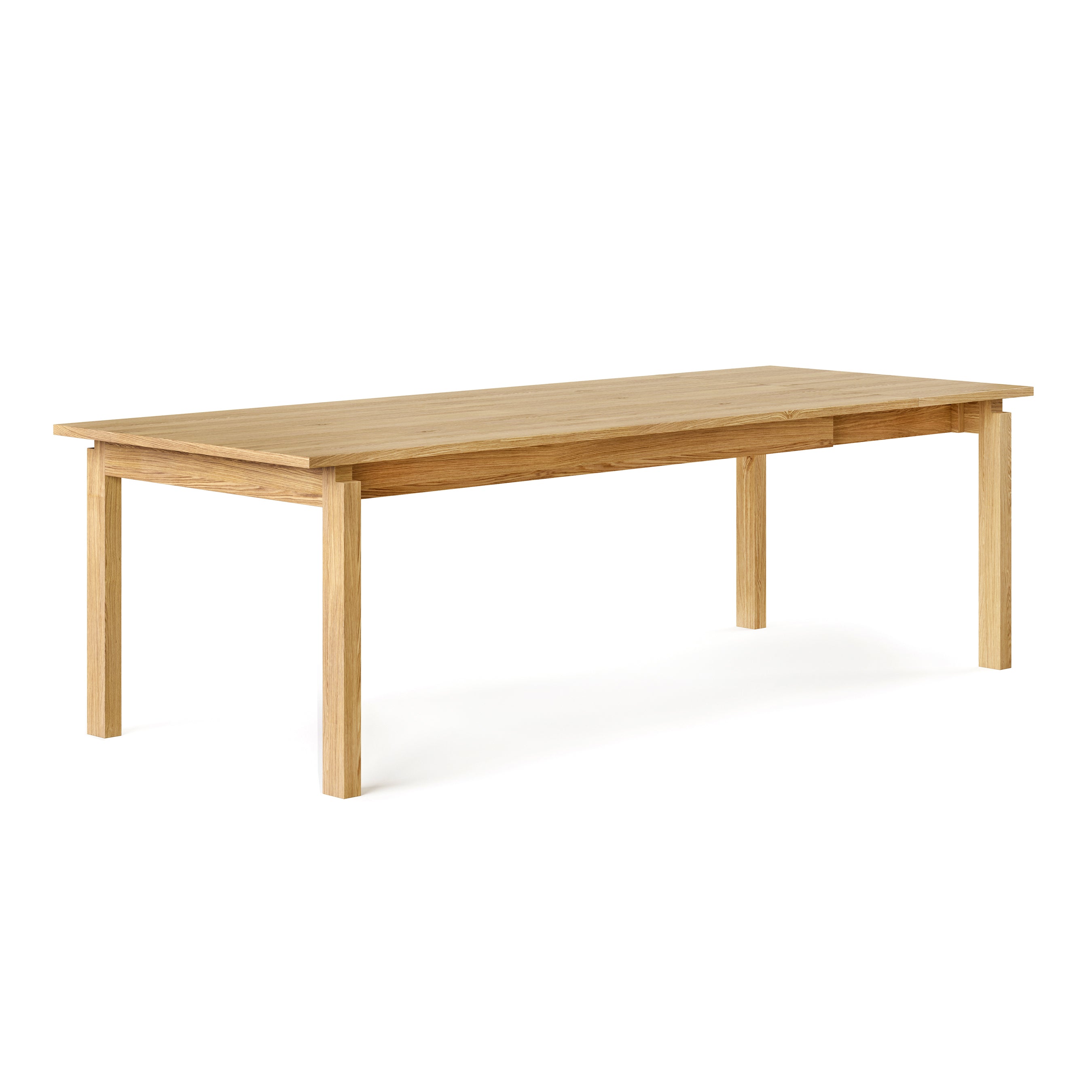 The Gus Modern Annex Extendable Dining Table is a rectangular wooden table with a natural finish, four straight legs, and a minimalist design, shown against a white background.