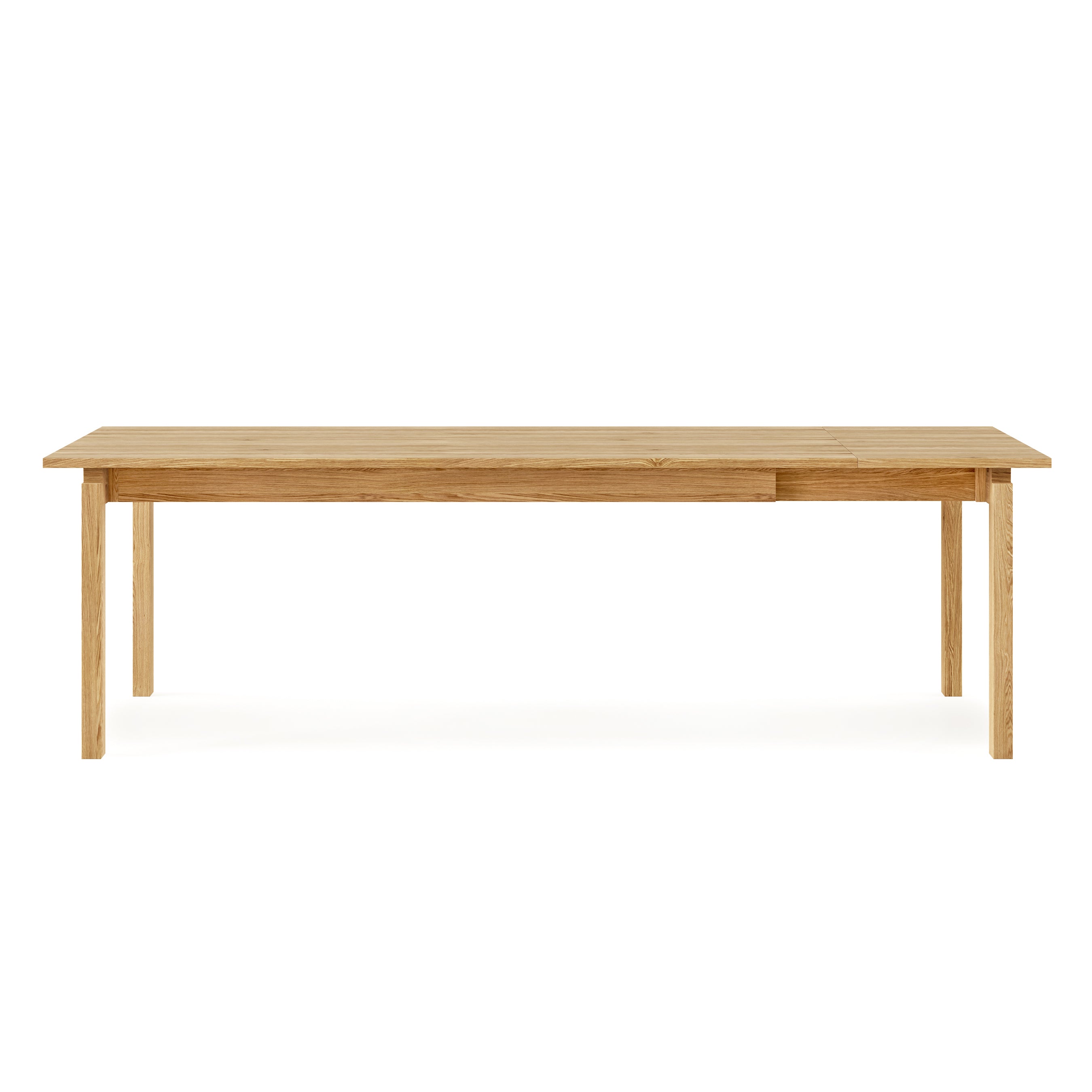 The Gus Modern Annex Extendable Dining Table is a rectangular wooden table with four straight legs and a smooth surface, shown against a white background.
