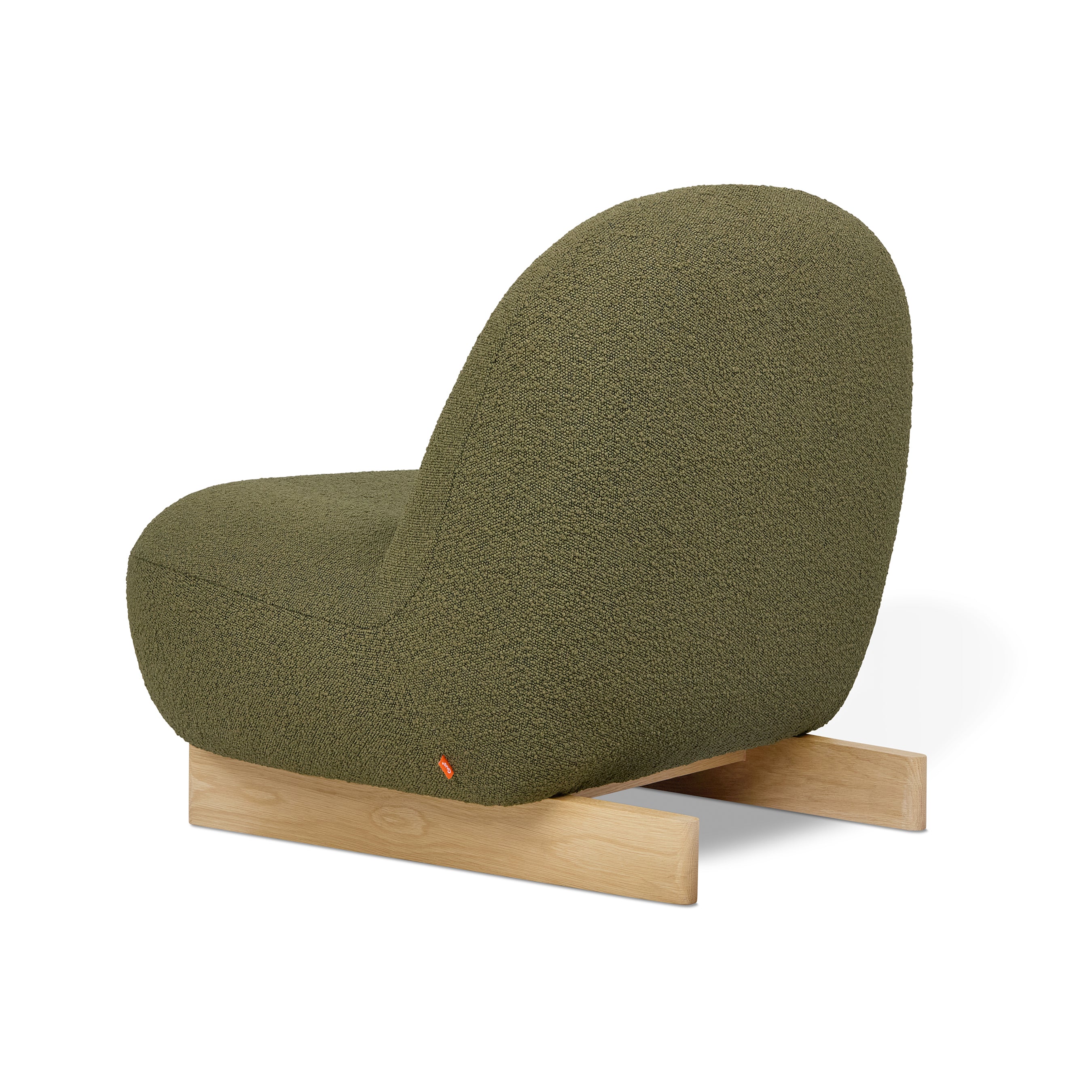 The Gus Modern Arlo Chair features olive green bouclé fabric, a rounded back and seat, plus light wood sled legs—Scandinavian-inspired style displayed on a white background.