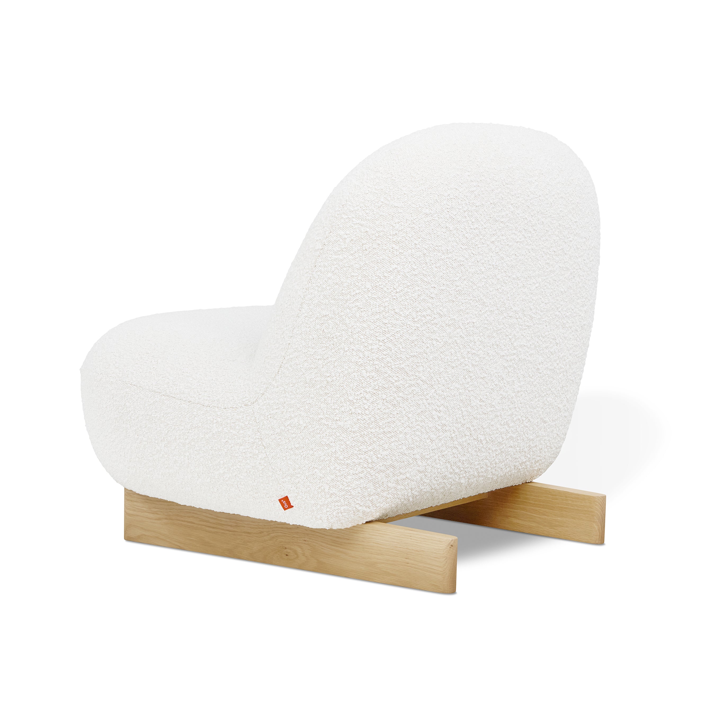 The Arlo Chair by Gus Modern features a modern white bouclé upholstered seat with a rounded back, supported by two simple light wooden legs, shown on a white background.