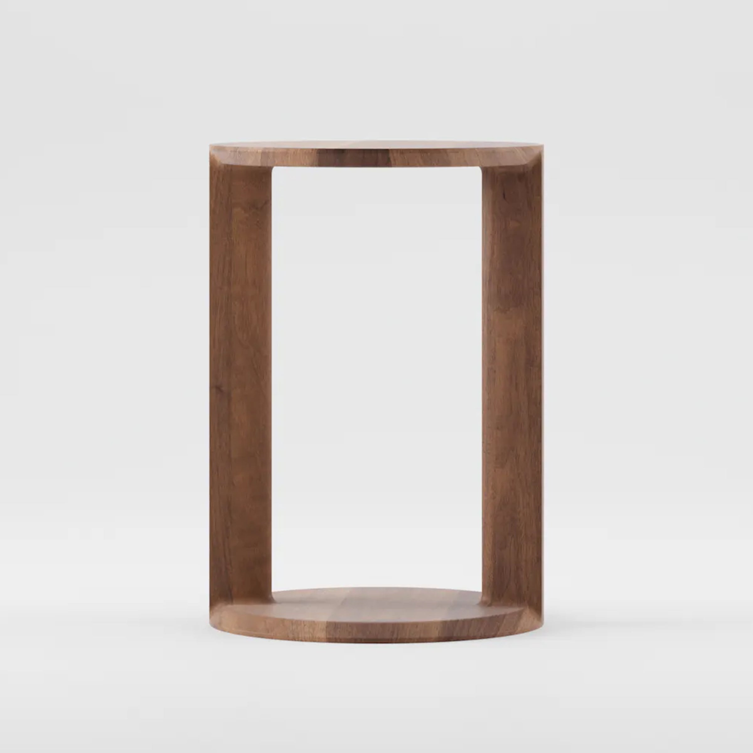 The BOAZ Sidetable by Artisan is a minimalist design crafted from solid wood with an open, rectangular structure. It features a smooth, natural finish enhanced by natural oils. Its flat surfaces are connected by vertical supports, creating an eco-friendly and modern look.