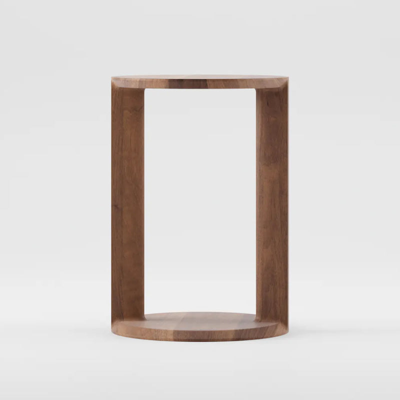 The BOAZ Sidetable by Artisan is a minimalist design crafted from solid wood with an open, rectangular structure. It features a smooth, natural finish enhanced by natural oils. Its flat surfaces are connected by vertical supports, creating an eco-friendly and modern look.