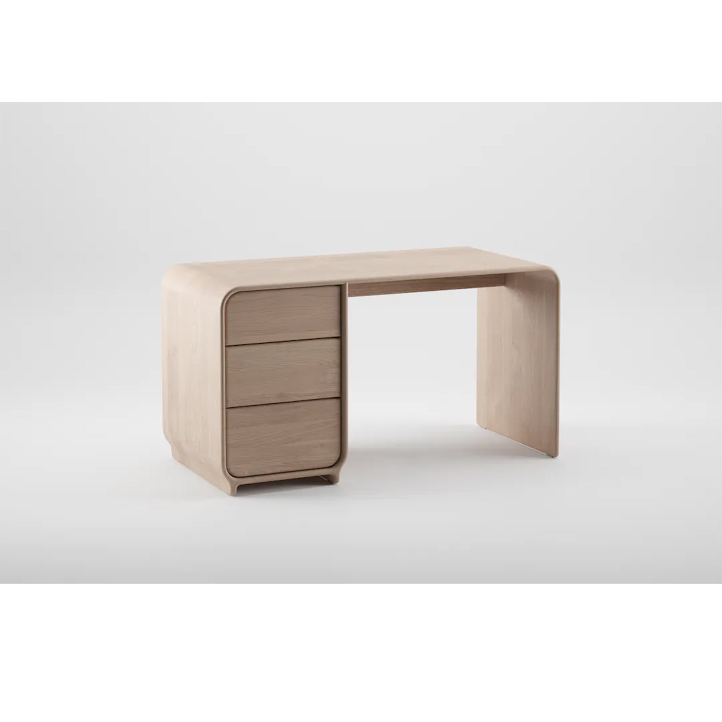 The ENY Working Desk by Artisan is a minimalist piece made from solid wood with natural oil finish. It includes three drawers on the left, an open leg area on the right, and boasts rounded edges and a clean, modern design against a white background.