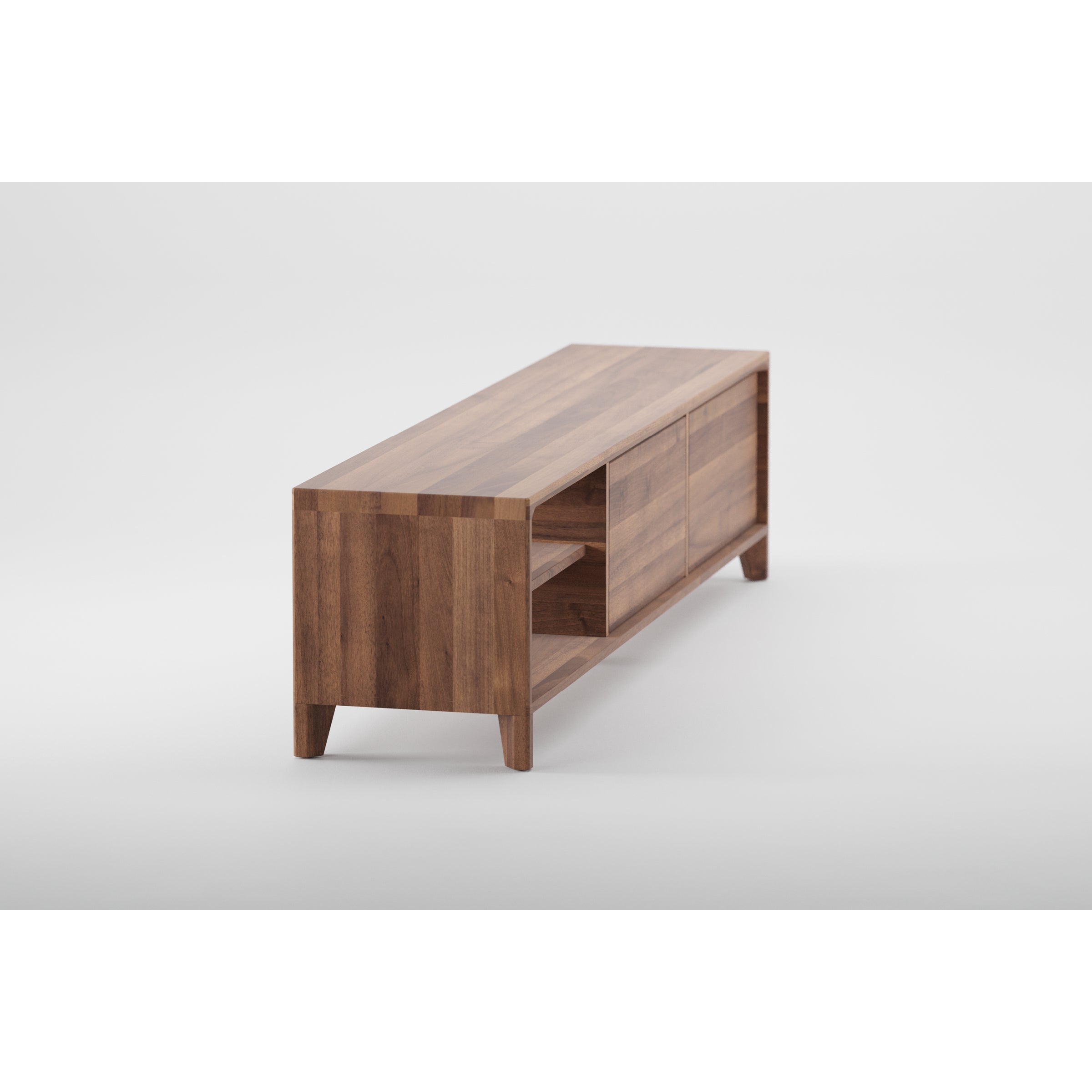 The Artisan HANNY Lowboard boasts a natural wood texture and eco-friendly materials. It features minimalist design, open shelving on one side, closed storage on the other, and stands on four short tapered legs against a white background.