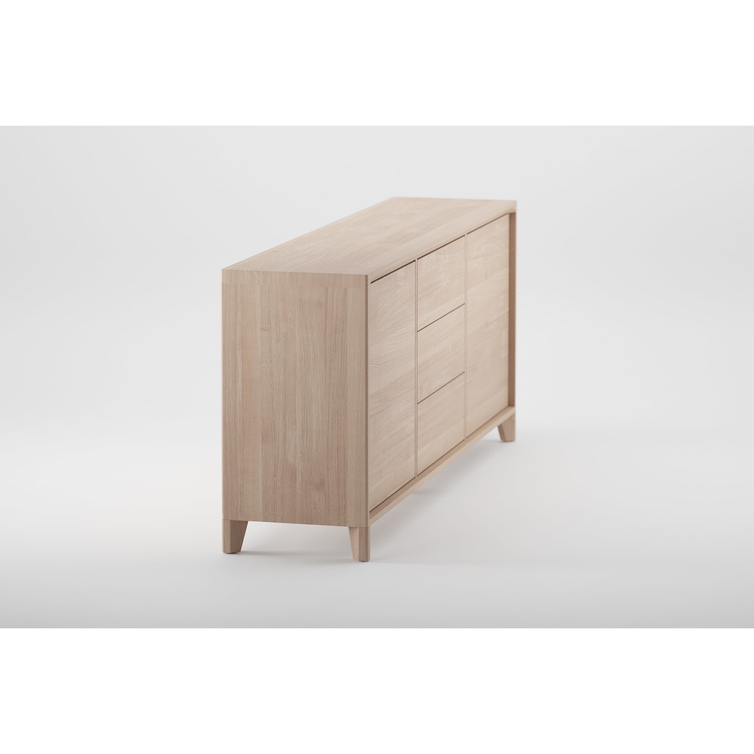 The Artisan HANNY Sideboard, set against a white background, highlights its sleek minimalist design made from solid wood. The light finish, enhanced by natural oils and wax, features clean lines and four sturdy legs for an eco-friendly storage solution.