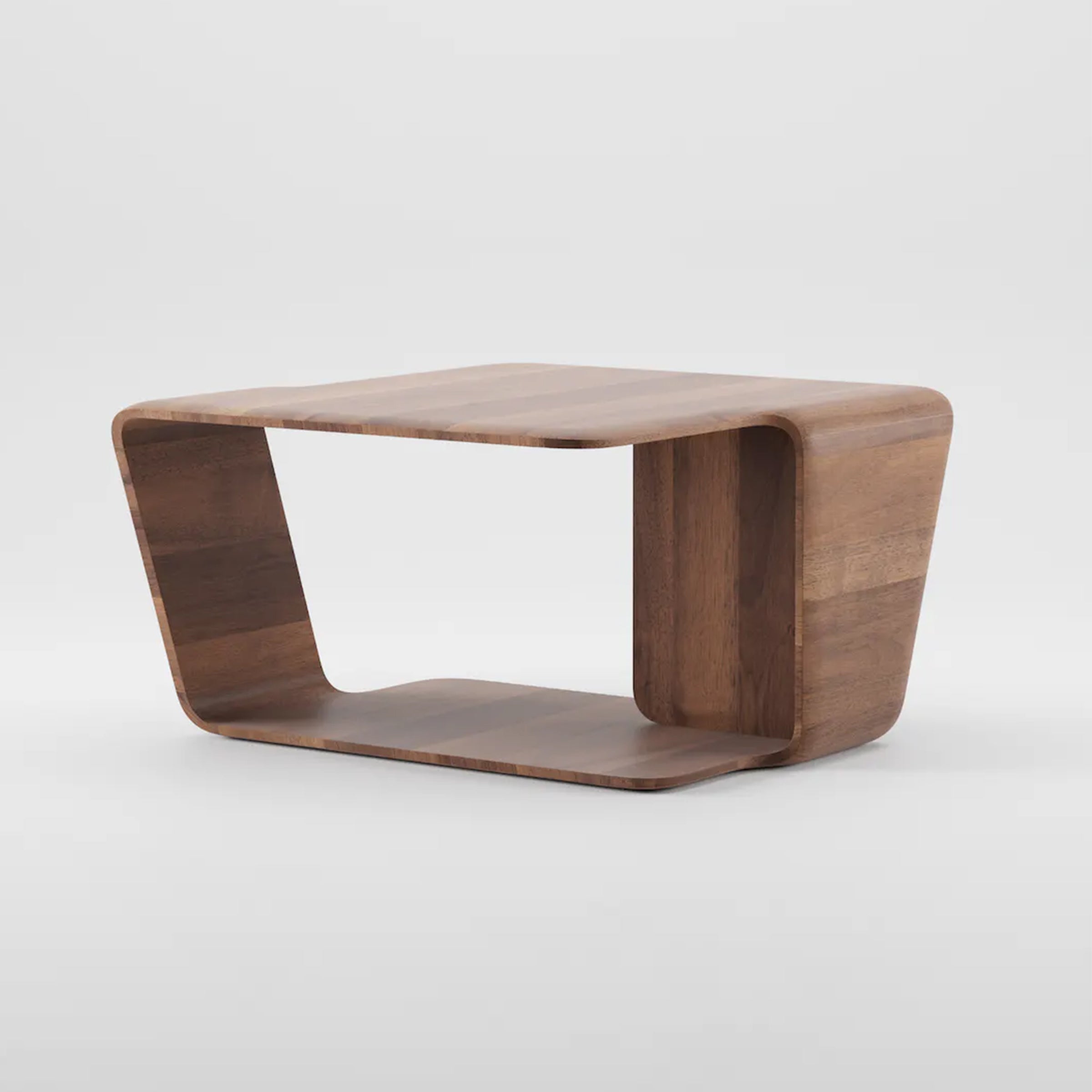 The Mars Coffee Table by Artisan is a modern side table with curved corners and an open rectangular base, crafted from solid wood treated with natural oils. It features a smooth, polished finish that highlights its natural grain while being environmentally friendly.